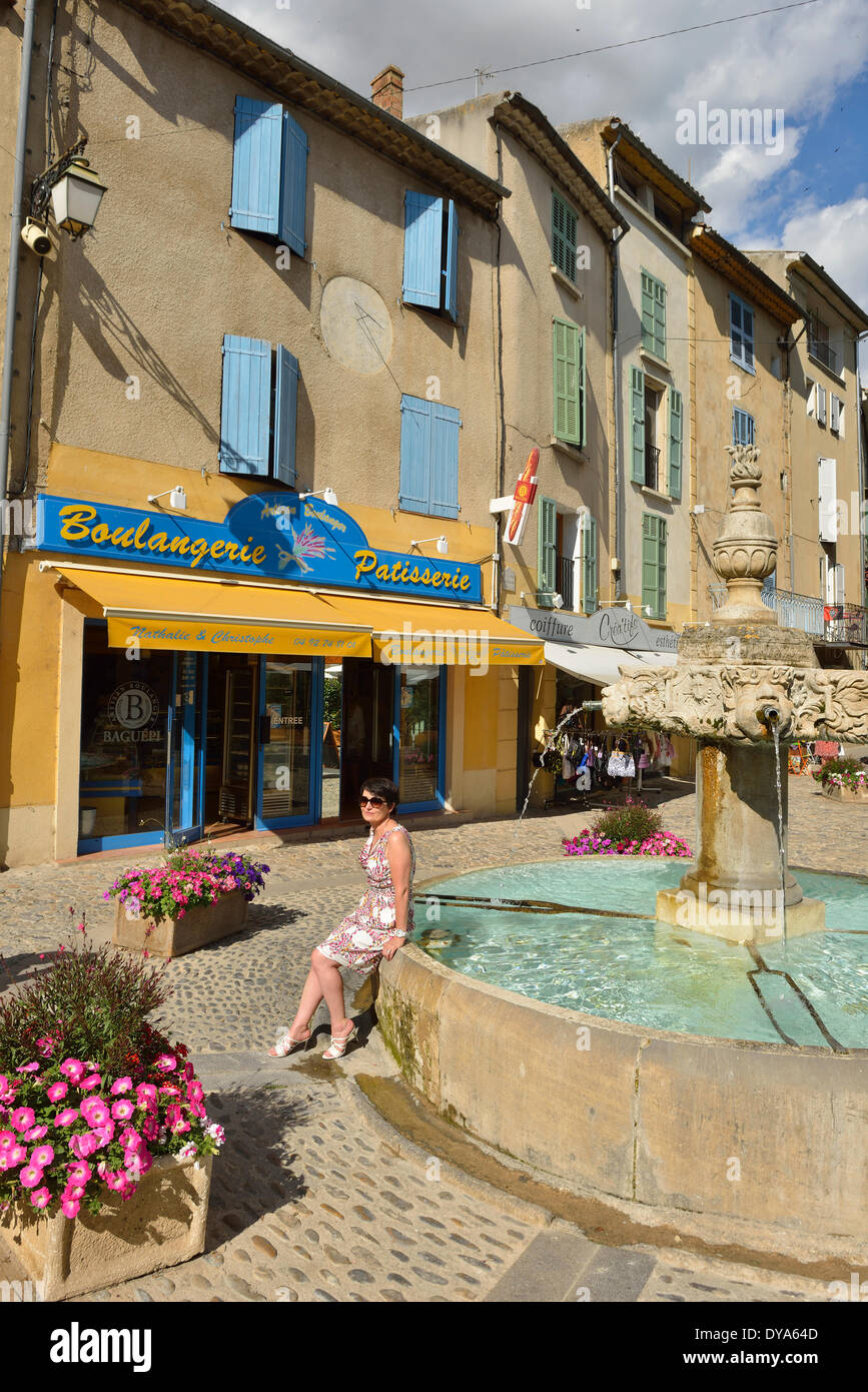 Europe, France, Provence, Valensole, Alpes de Haute Provence, square, fountain, woman, french, village, released, french Stock Photo