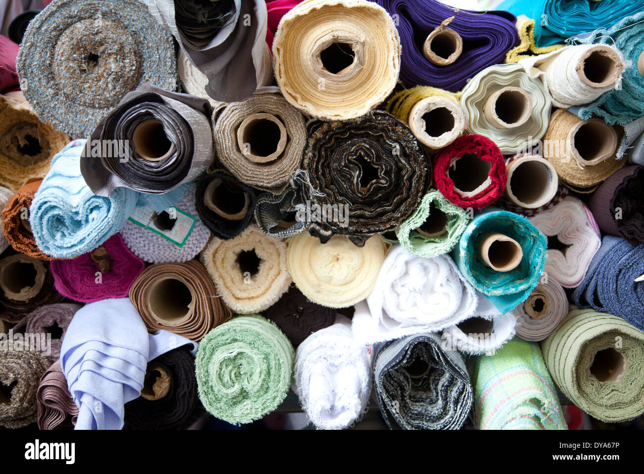 Colorful Fabrics In Warehouse. Rolls Of Fabrics For Sewing. Stock Photo,  Picture and Royalty Free Image. Image 121564787.
