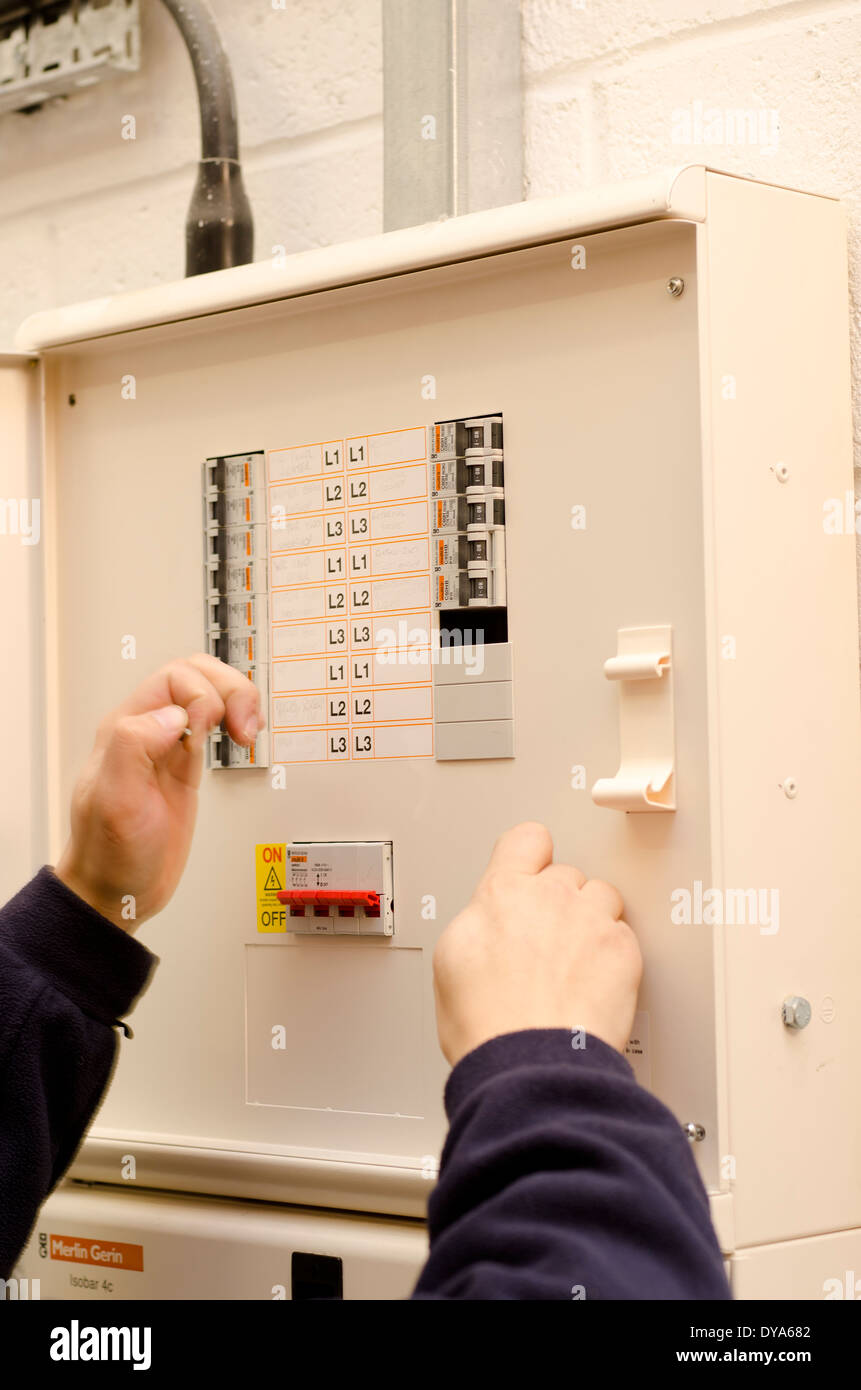 Electrical with two hands hires stock photography and images