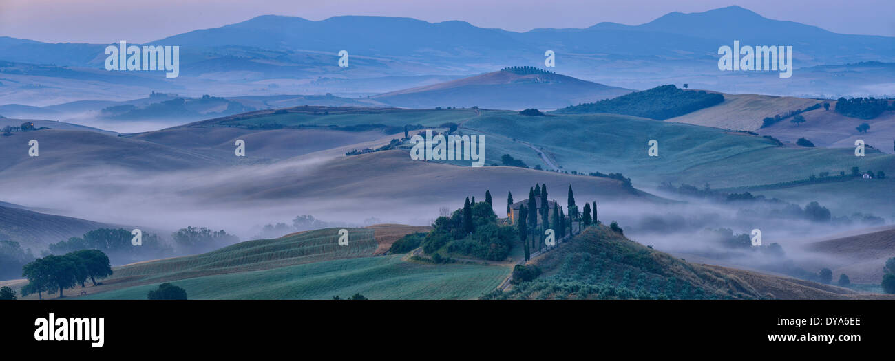 Europe mediterranean italian Italy Tuscany Siena Province San Quirico D'Orcia landscape fog morning no people panorama Stock Photo