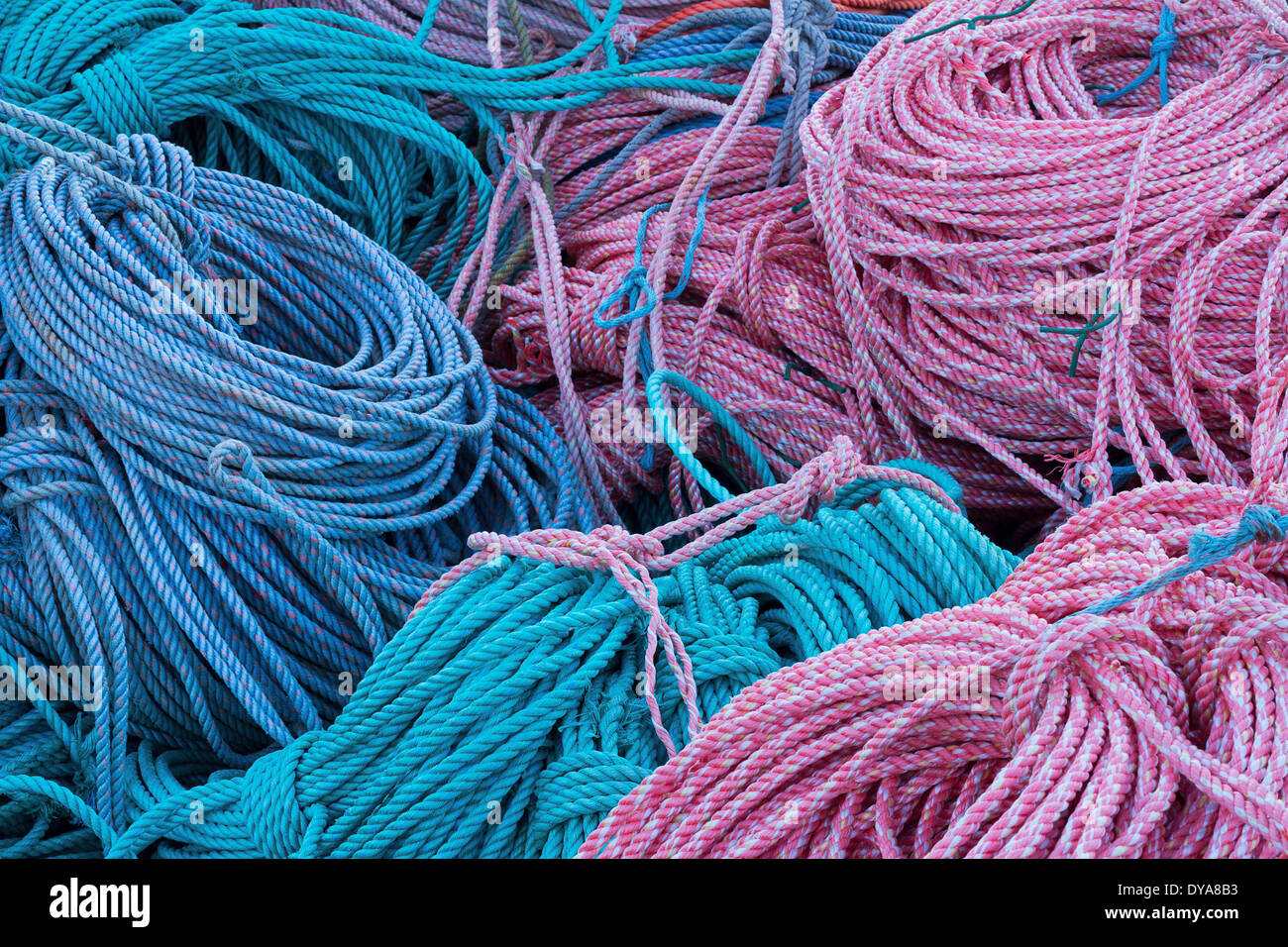 rope coil coiled coils pattern colour dock harbor harbour fishing crabbing sea ocean warf seaside Oregon OR USA America, Stock Photo
