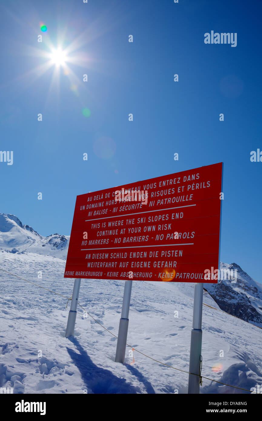 Danger warning sign at edge of ski area Stock Photo