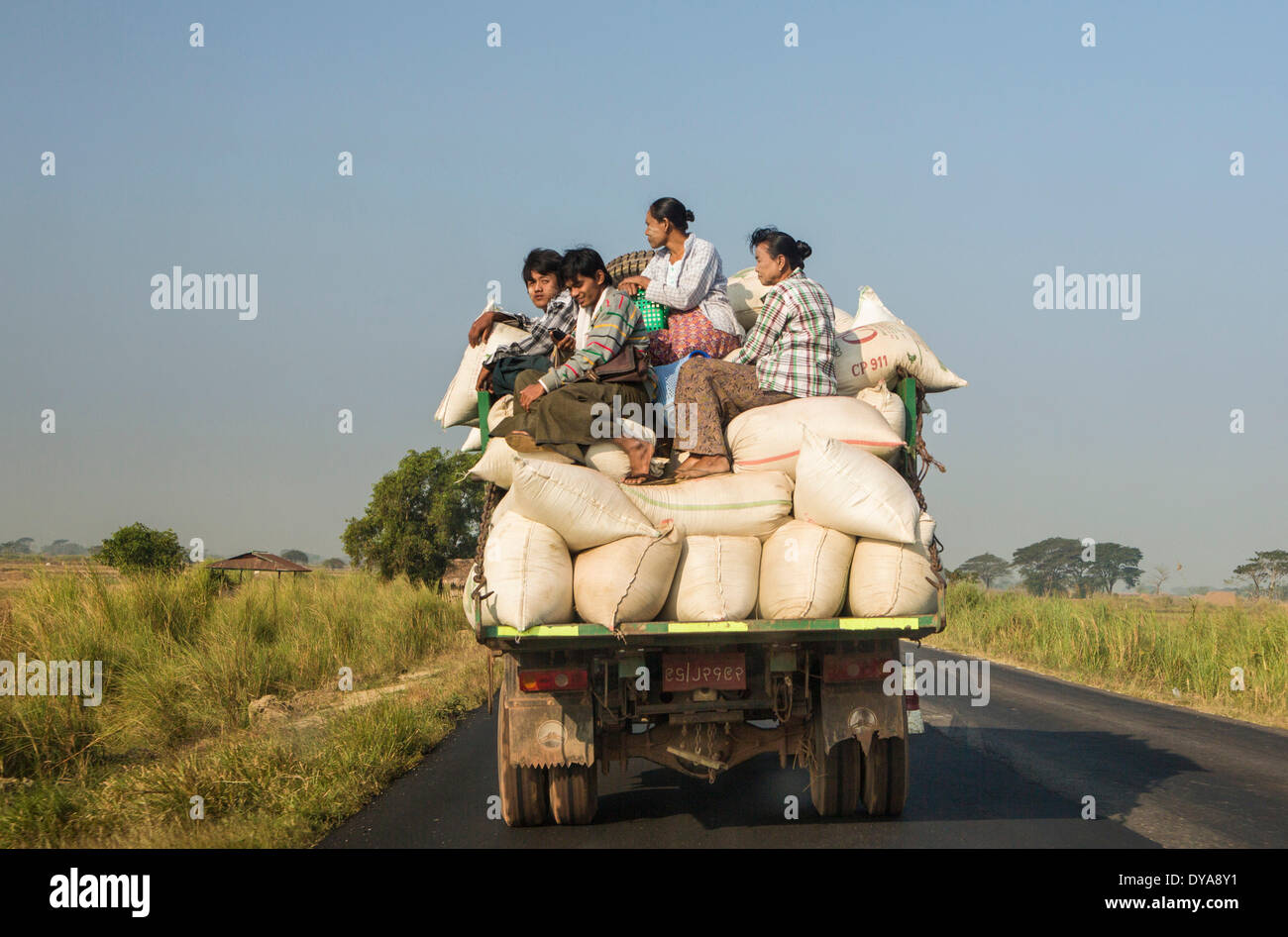 Local transport, Mon, Myanmar, Burma, Asia, dangerous, people, traffic, truck, overloaded Stock Photo