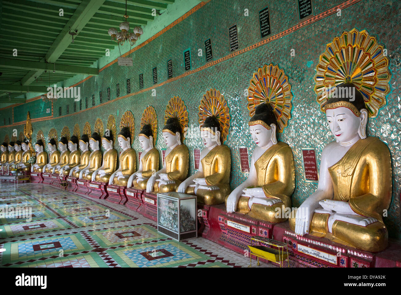 Mandalay Myanmar Burma Asia Sagaing architecture Buddha Buddhism buddhas colourful green many pagoda golden religion touris Stock Photo