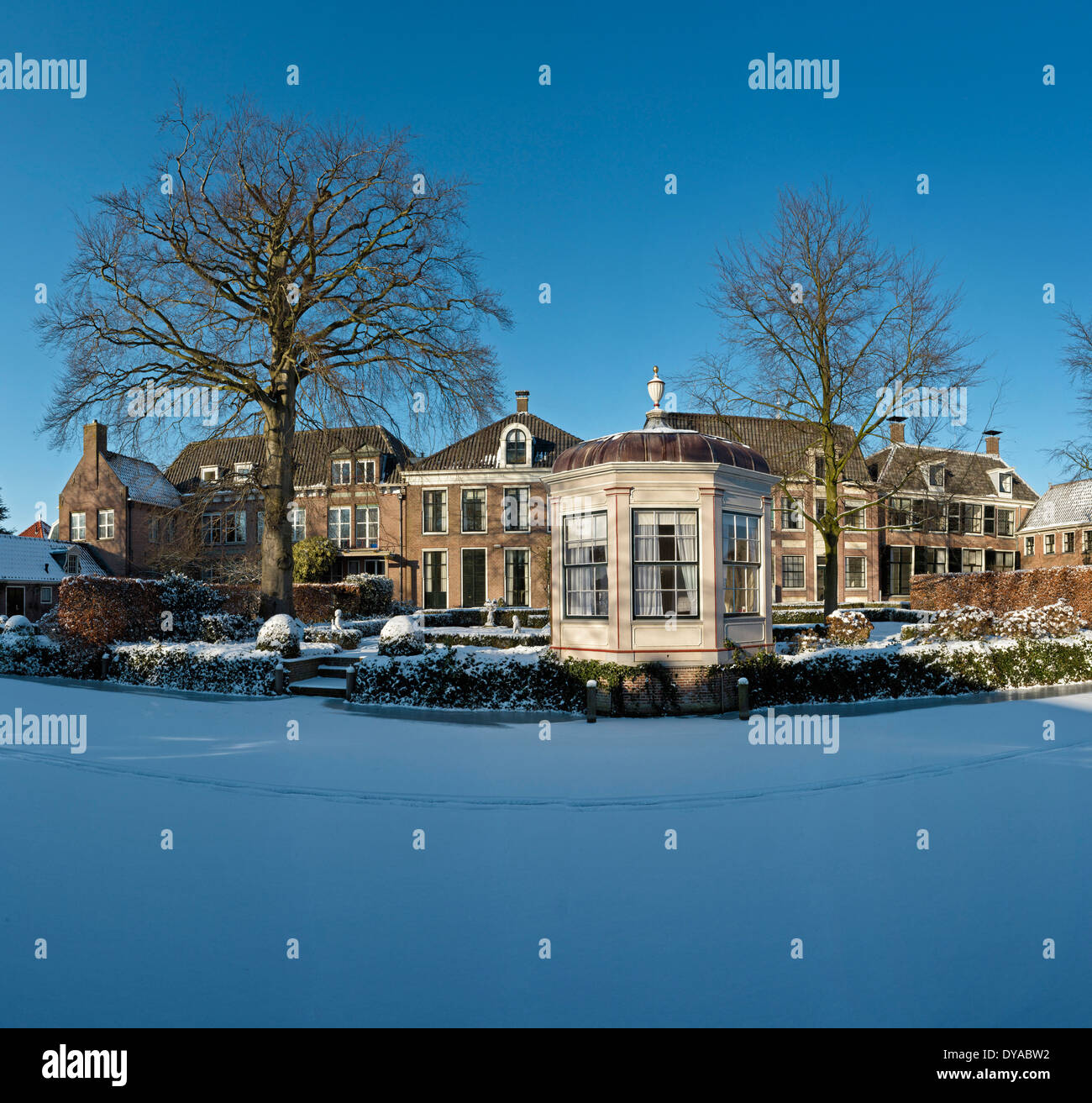 Netherlands, Holland, Europe, Edam, North Holland, city, village, water, trees, winter, snow, ice, Summer house, frozen, canal Stock Photo