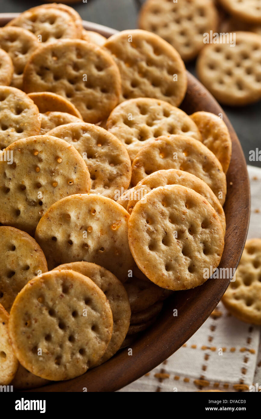 Whole Grain Wheat Round Crackers in a Bowl Stock Photo