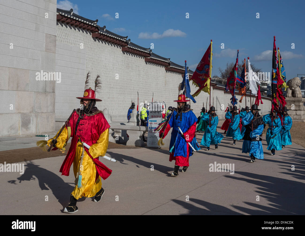 World Heritage Guardsmen no model release Gwangwha-mun Gyeongbog-Gung Korea Asia Parade Seoul city colourful flags gate guard Stock Photo