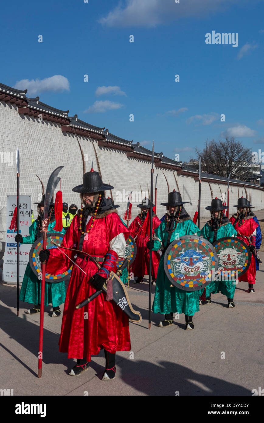 World Heritage Guardsmen no model release Gwangwha-mun Gyeongbog-Gung Korea Asia Parade Seoul city colourful flags gate guard Stock Photo