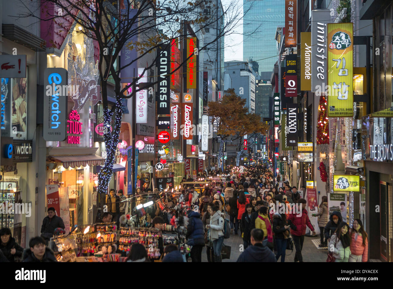 Korea, Asia, Myeongdong, Seoul, busy, city, colourful, district, landmark, lights, people, shopping, street, sunset, night Stock Photo