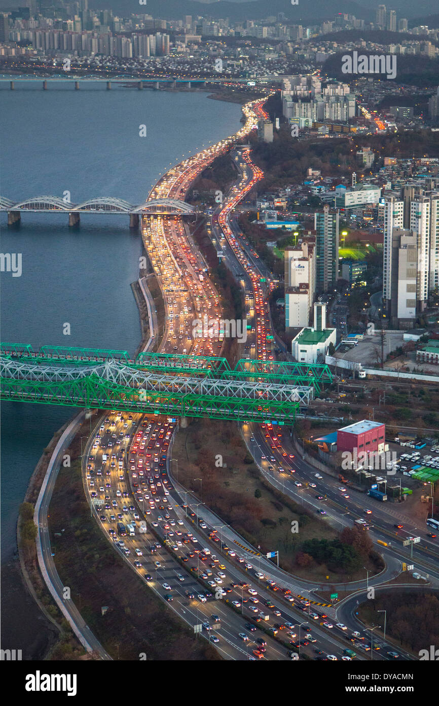 Korea, Asia, Seoul, Yeouido, aerial, cars, city, colourful, expressway, lights, rush hour, evening, river, traffic, travel Stock Photo