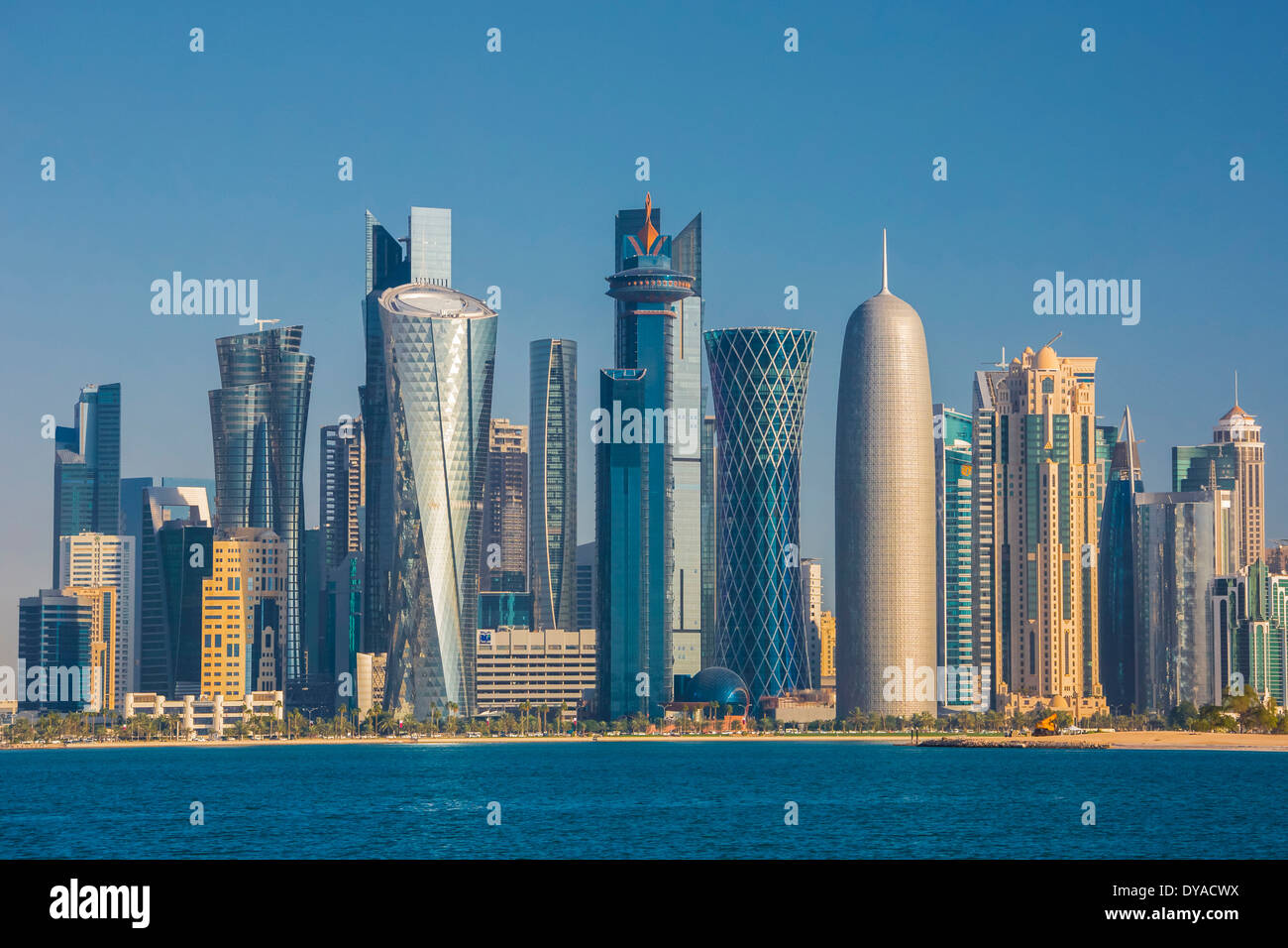 Al Bidda Burj Doha Qatar Middle East World Trade Center architecture bay city colourful corniche futuristic skyline skyscrape Stock Photo