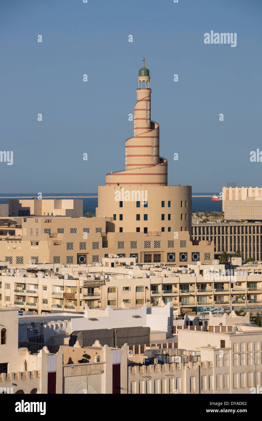 Doha Qatar Middle East architecture center city Islamic minaret mosque old symbol touristic tower travel Islamic Center Stock Photo