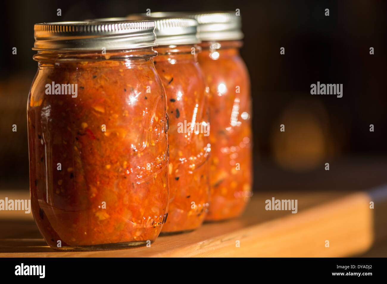 Glass jar of salsa Stock Photo Alamy