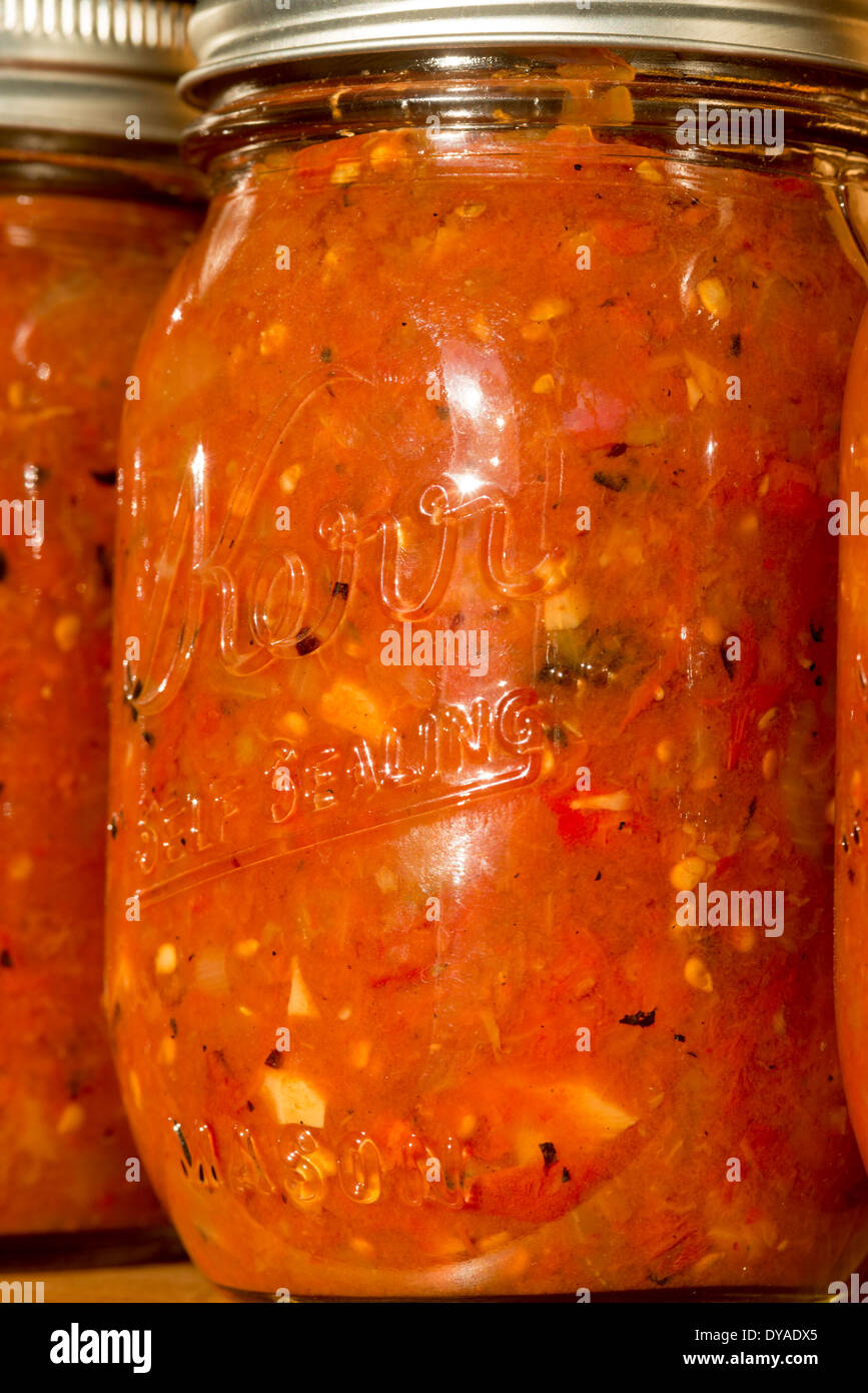 Glass jar of salsa Stock Photo - Alamy