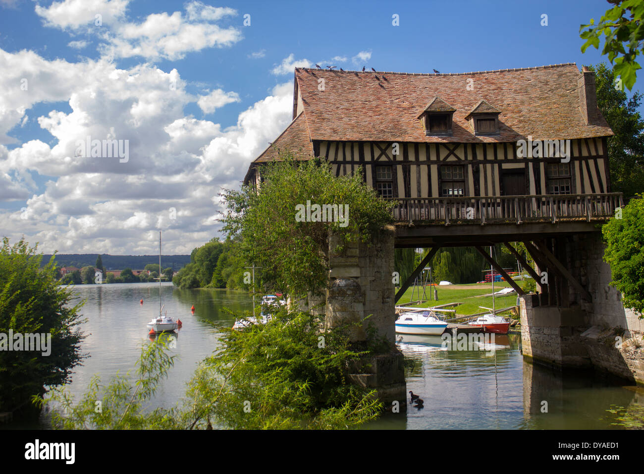The old mill of Vernon, a half timbered house hanging over the river ...