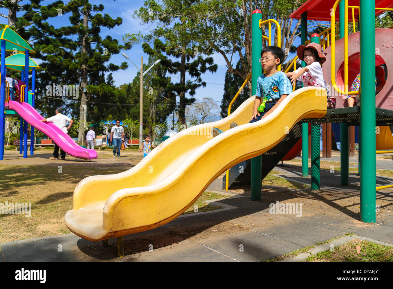 Children playing in the playground area on top the Penang hill, Penang