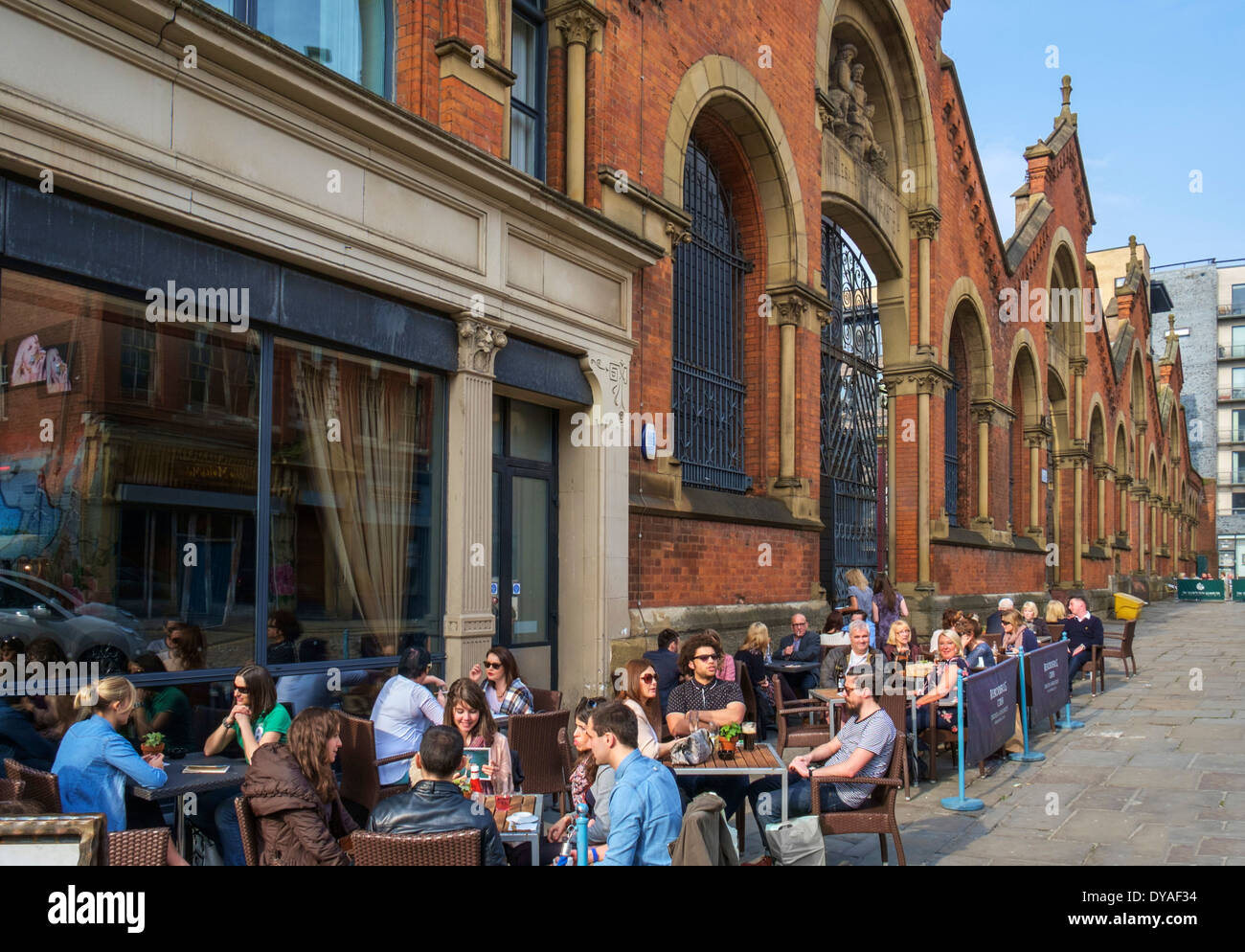 Pavement cafe by the old Wholesale Fish Markets building on High Street, Northern Quarter, Manchester, England, UK Stock Photo
