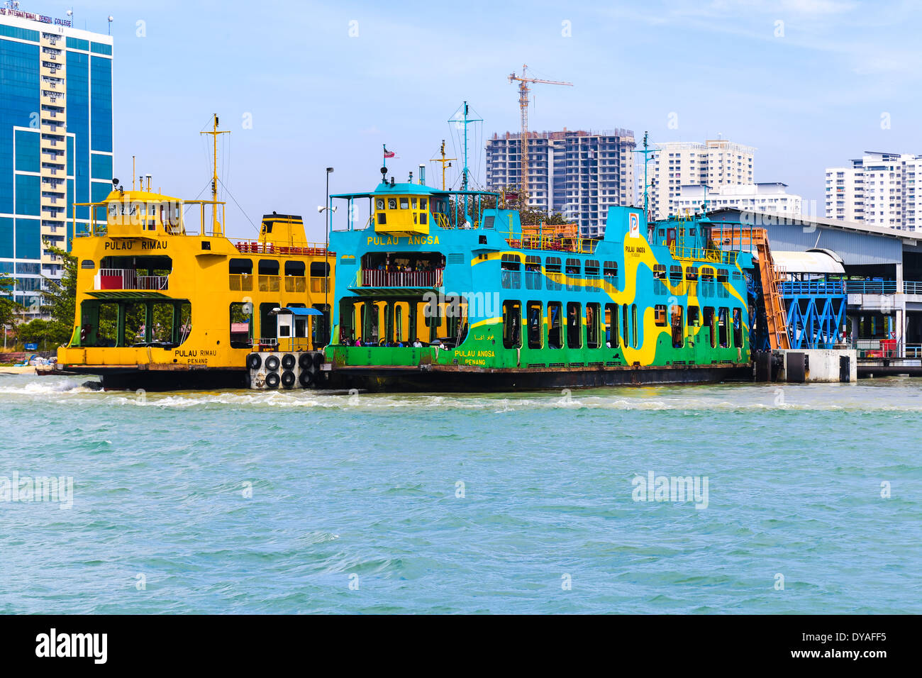 Ferry cruising between Malaysia mainland and Penang island. It is one of Penang tourism heritages Stock Photo