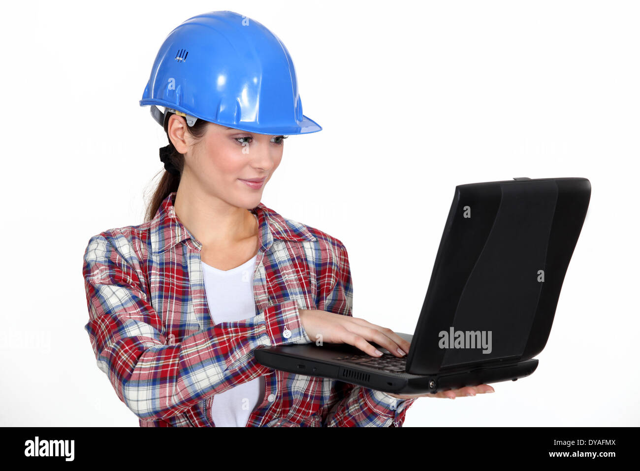 Female architect correcting designs Stock Photo