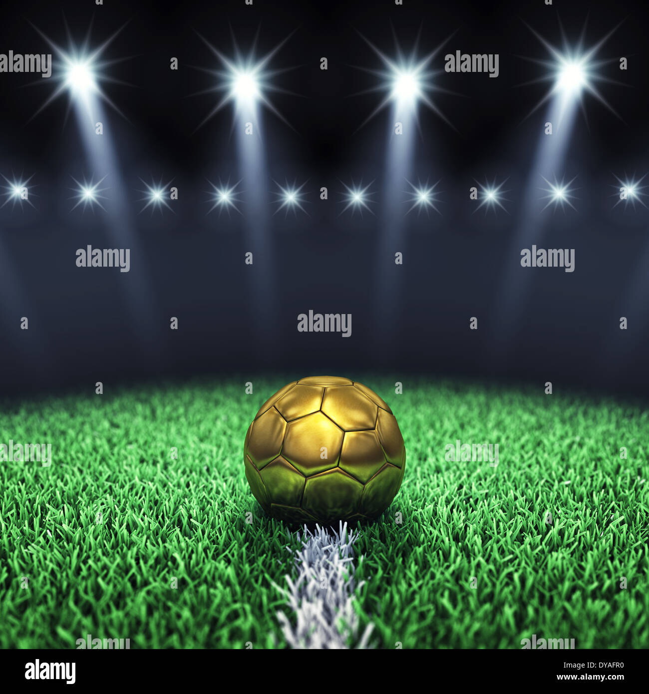 Soccer arena and golden ball with floodlights Stock Photo