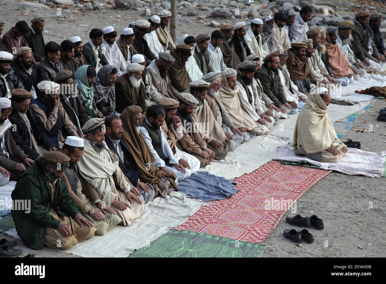 Afghan villagers hold a prayer December 7, 2009 in Lachey village, Shigal district, Kunar province, Afghanistan. Stock Photo