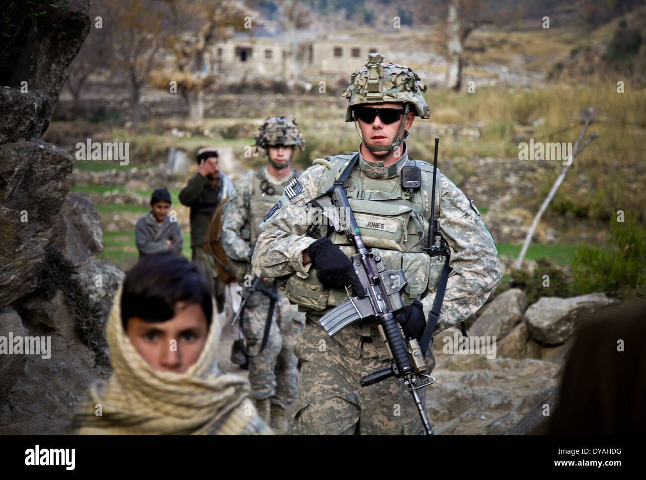 US Army soldiers with the Kunar Provincial Reconstruction Team, depart after holding a shura, or meeting December 7, 2009 in Lachey village, Shigal district, Kunar province, Afghanistan. Stock Photo