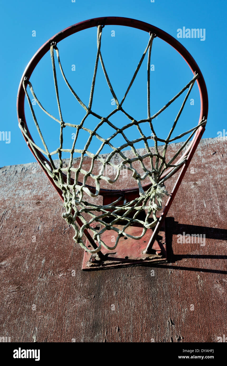 closeup of old basketball backboard and hoop outdoor Stock Photo