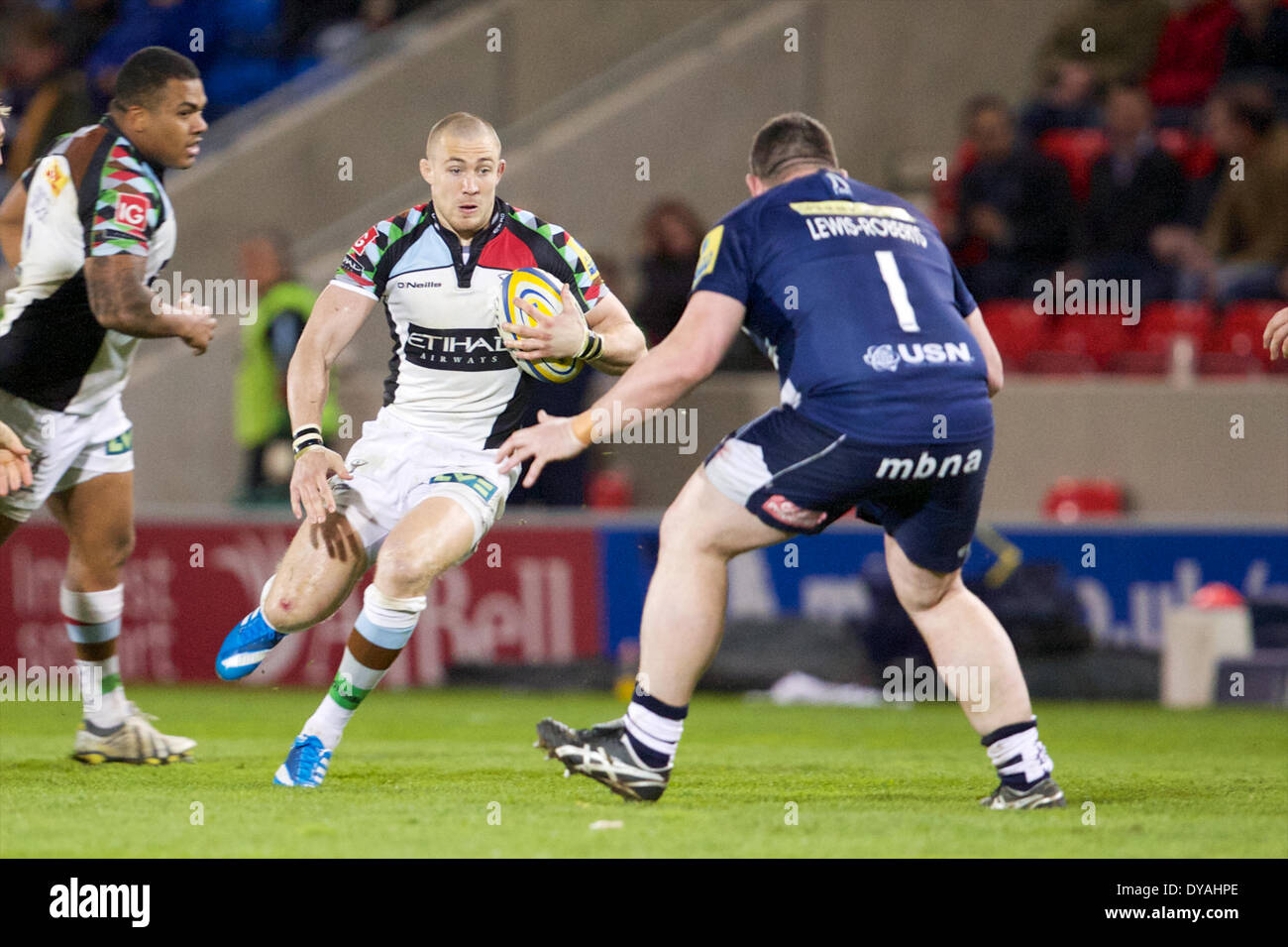 Sale, UK. 11th Apr, 2014. Harlequins fullback Mike Brown and Sale Sharks prop Eifion Lewis-Roberts in action during the Aviva Premiership Rugby match between Sale Sharks and Harlequins at the AJ Bell Stadium, Salford Credit:  Action Plus Sports/Alamy Live News Stock Photo