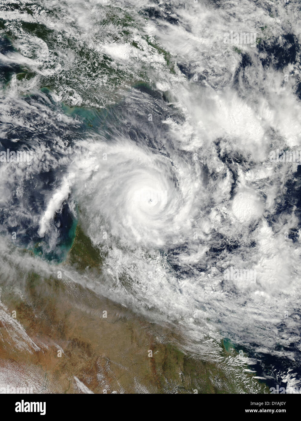 Satellite image was taken by the Suomi NPP satellite VIIRS instrument showing tropical Cyclone Ita April 11, 2014 off shore of Queensland, Australia. The fierce category-three storm hit northern Queensland winds of up to 170km/h (105mph). Stock Photo