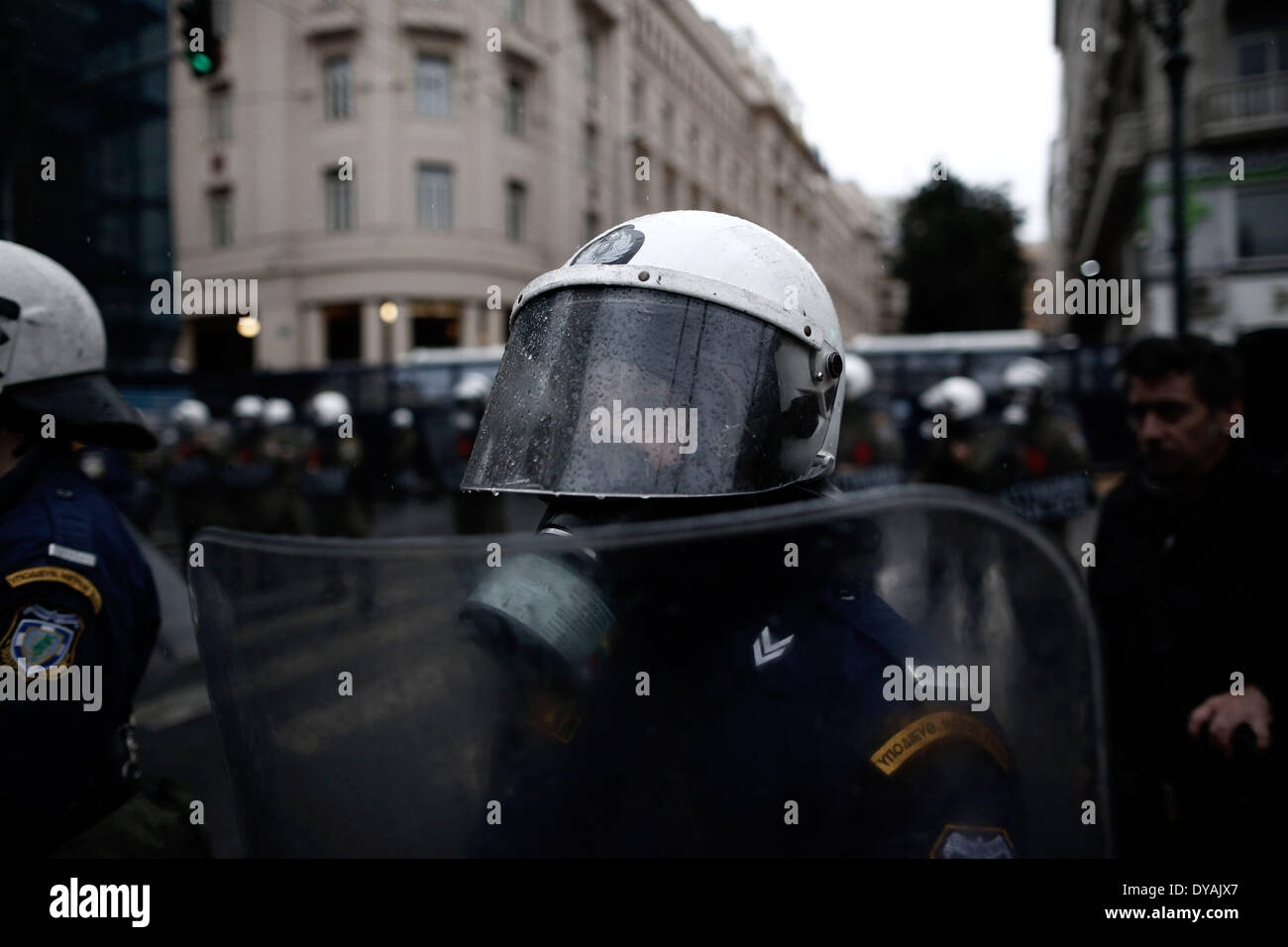 Athens, Greece. 11th Apr, 2014. Riot police block the road during a ...