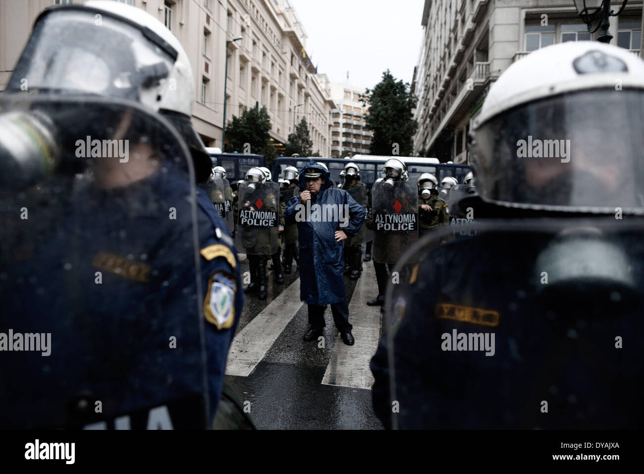 Athens, Greece. 11th Apr, 2014. Riot police block the road during a ...