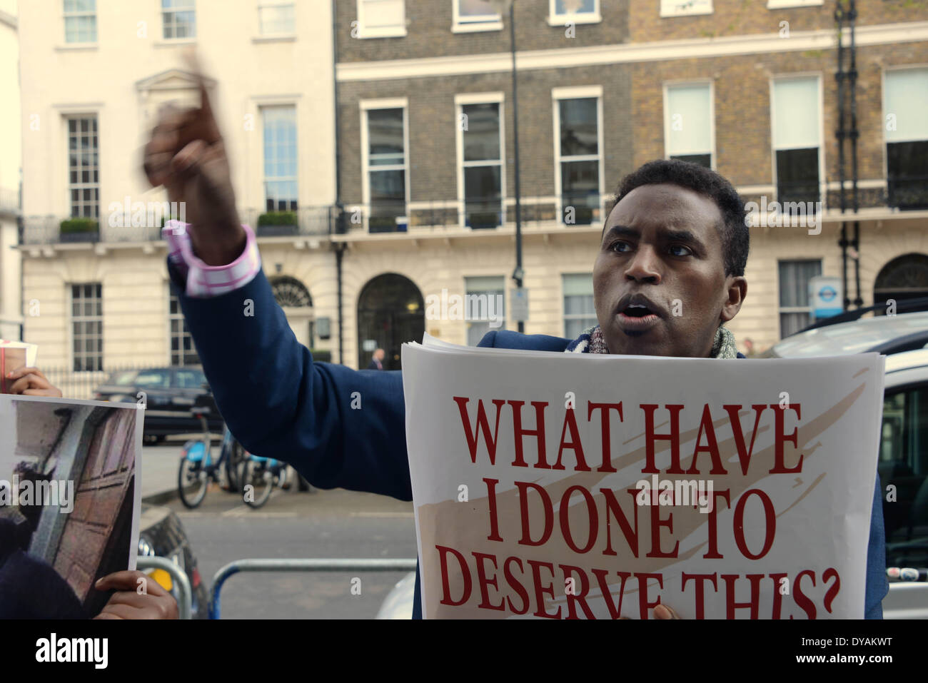 London 11th April 2014 : A group of Somali protest in front of the Kenya Emabssy against thousand of Somali men women and children being loaded onto trucks in Nairobi (Kasani Concentration Camp) and dump them in Somalia. Many of them are business owner in Kenya. all their business leaved in Kenya unclaim outside Kenya Embassy in London. Credit:  See Li/Alamy Live News Stock Photo