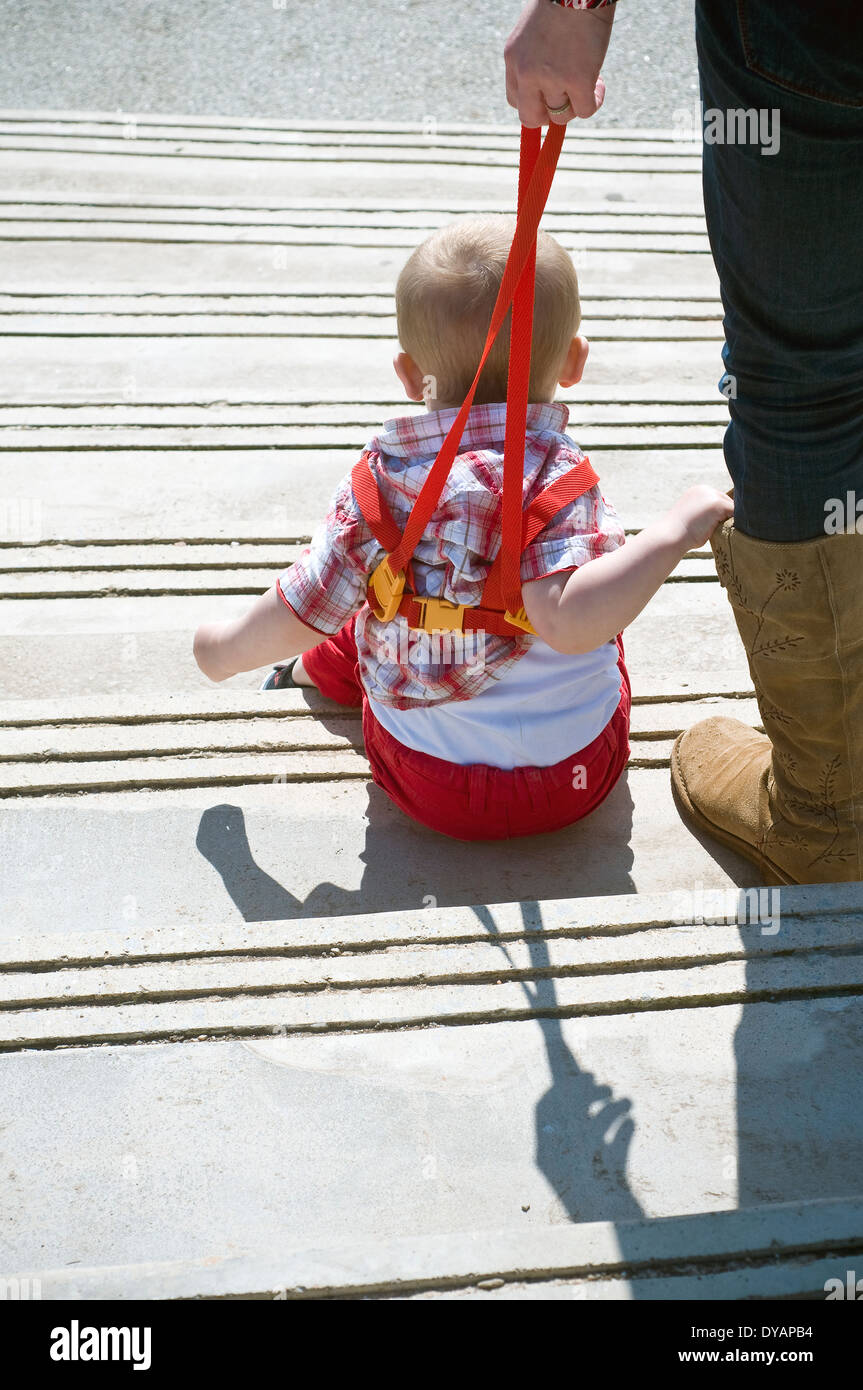 Stairs holding baby High Resolution Stock Photography and Images Alamy