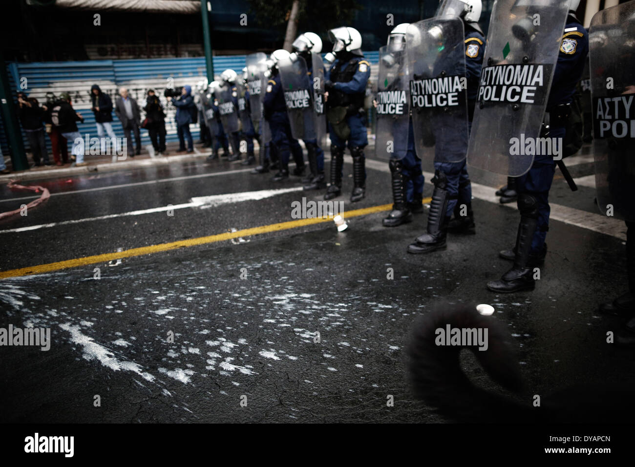 Athens, Greece. 11th Apr, 2014. Riot police block the road during a ...