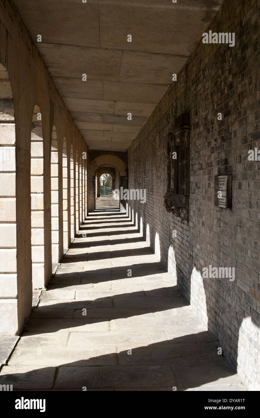 View of shadows in the colonnades near the chapel in Brompton Cemetery, Royal Borough of Kensington and Chelsea, London, UK. Stock Photo