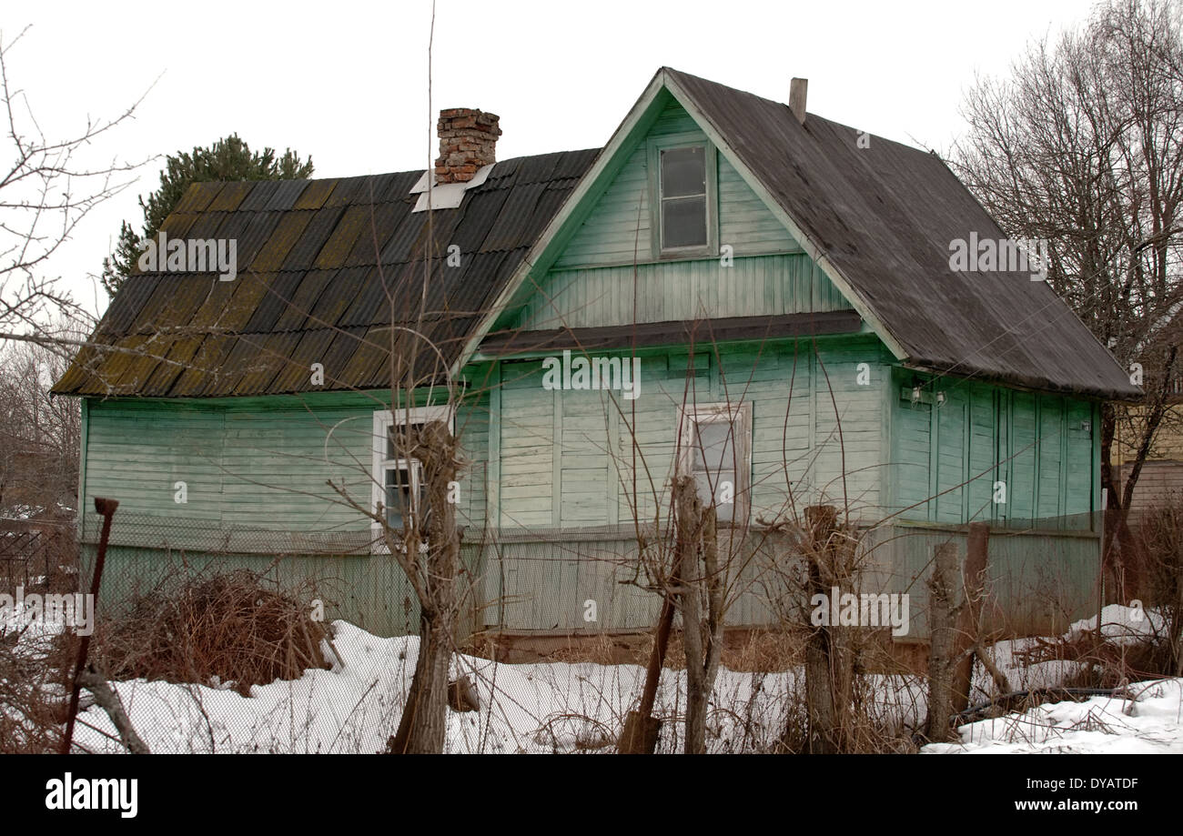 old green rural wooden house in Russian village Stock Photo