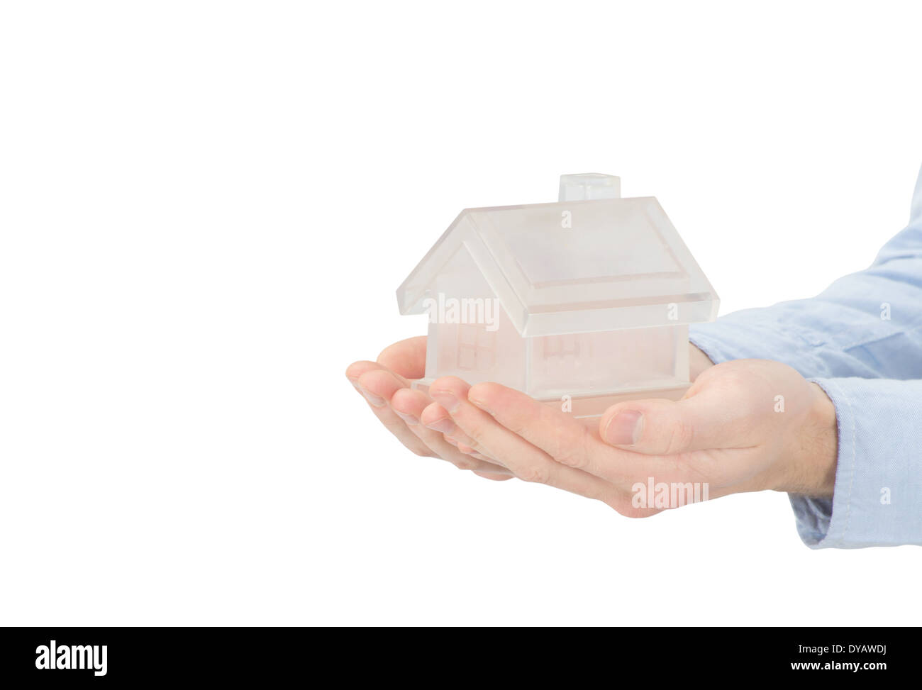 home in human hands on white Stock Photo