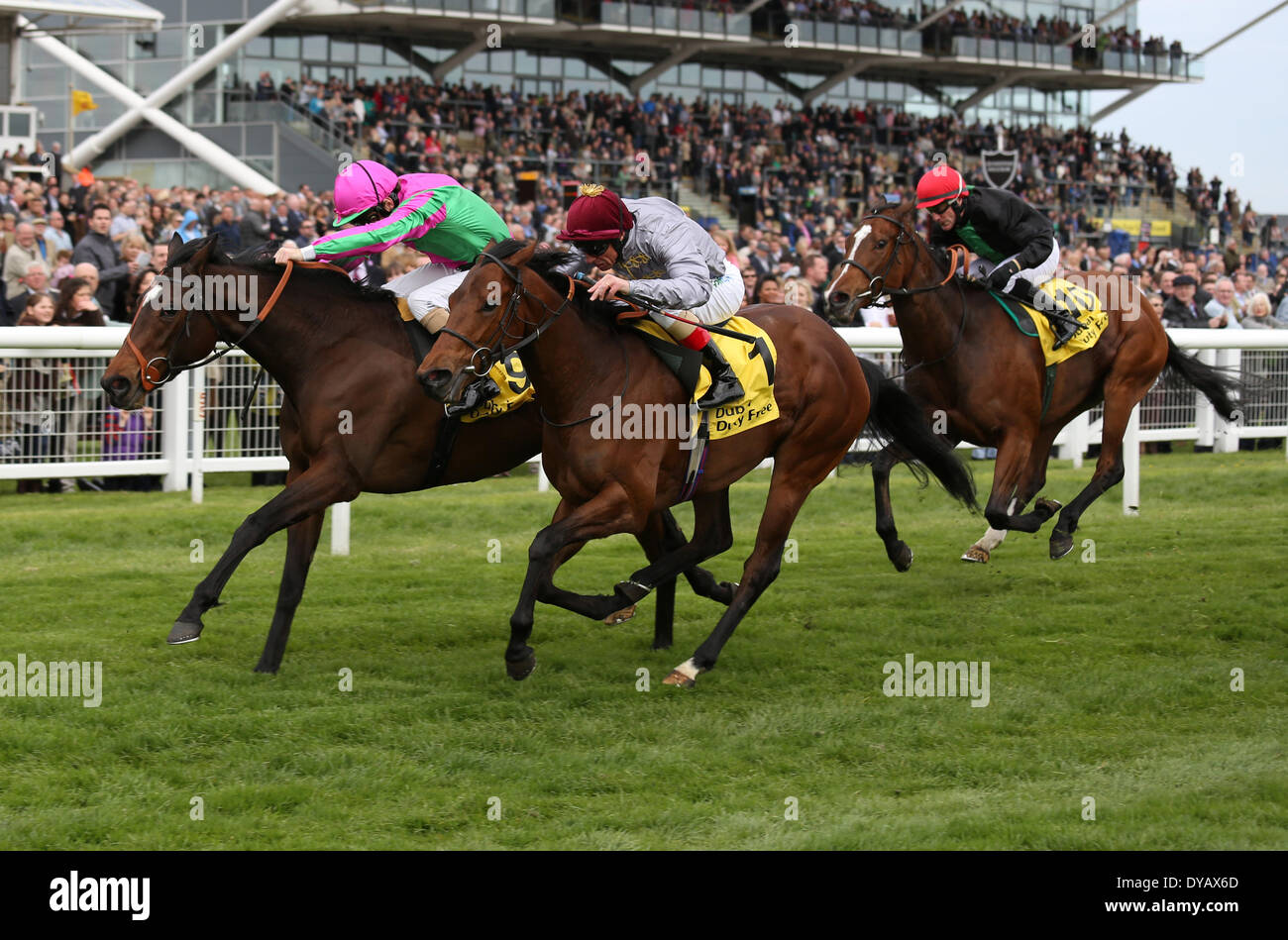 Newbury, UK. 12th Apr, 2014. J Wonder under Jimmy Fortune wins the Dubai Duty Free Stakes during the Dubai Duty Free and New To Racing Day at Newbury Racecourse Credit:  Action Plus Sports/Alamy Live News Stock Photo