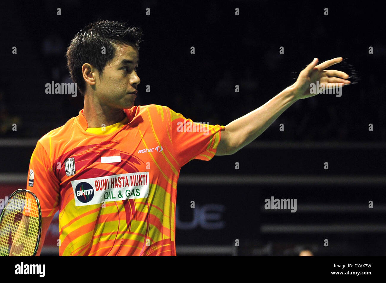 Singapore. 12th Apr, 2014. Simon Santoso of Indonesia reacts during the men's singles semi-final match at the OUE Singapore Open badminton tournament against Du Pengyu of China in Singapore, April 12, 2014. Simon Santoso won 2-1. Credit:  Then Chih Wey/Xinhua/Alamy Live News Stock Photo