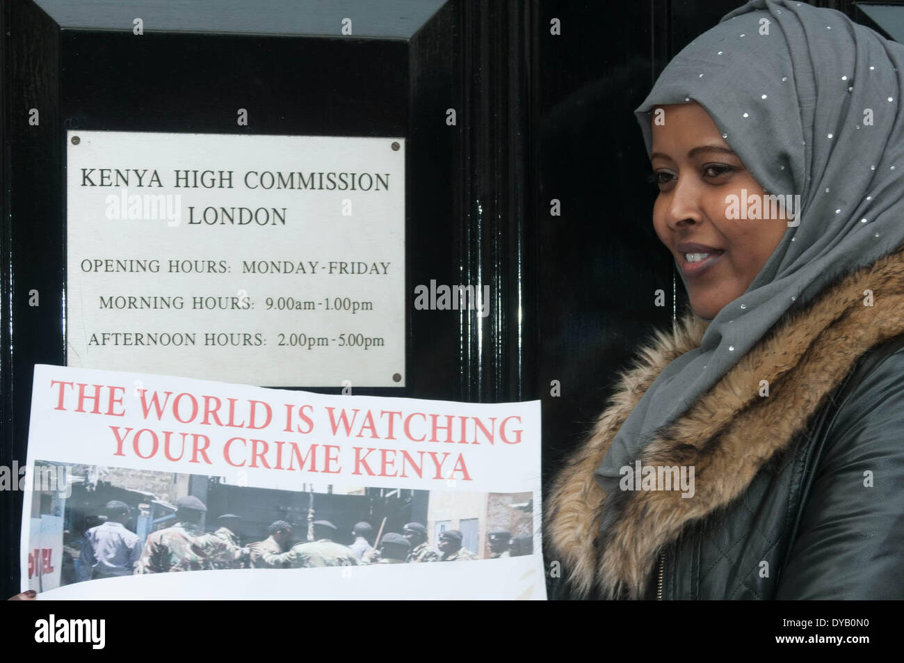 London 12th April 14 : Protesters holding placard at the front of Kenya Embassy in London. Credit:  See Li/Alamy Live News Stock Photo