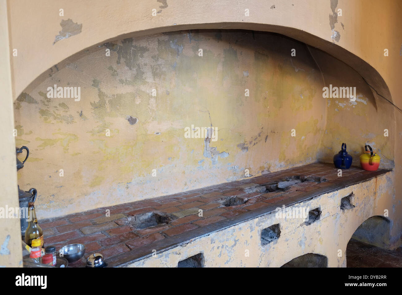 A Cuban 16th century wood-fired kitchen still being used in the Quince Catorce restaurant, Trinidad, Cuba. Stock Photo