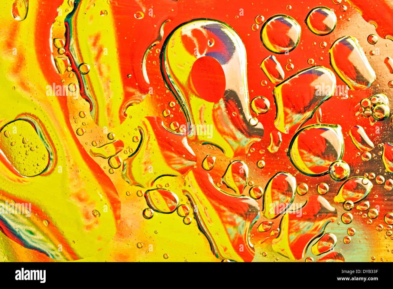 Oil drops on a water surface Stock Photo