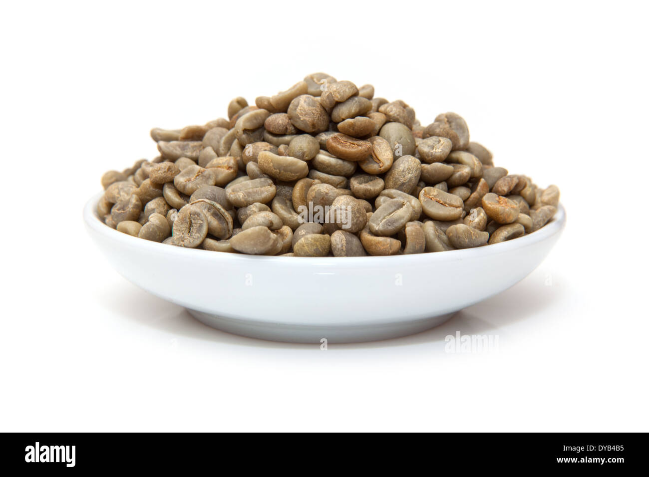 Green Arabica coffee beans isolated on a white studio background Stock ...