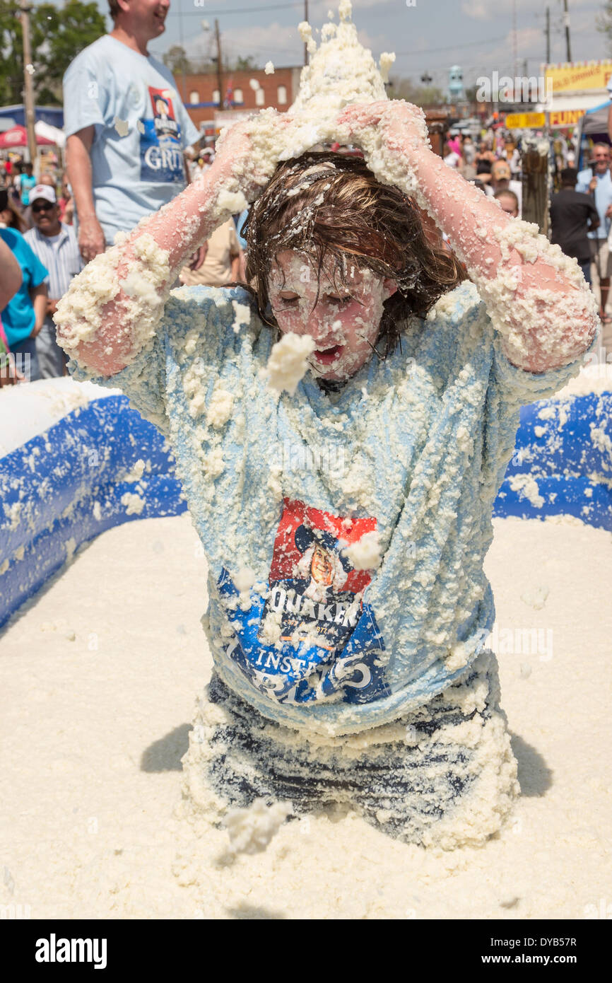 St. South Carolina, USA. 12th Apr, 2014. A girl rolls in a vat