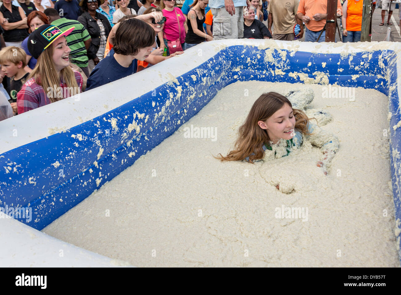 St. South Carolina, USA. 12th Apr, 2014. A girl rolls in a vat