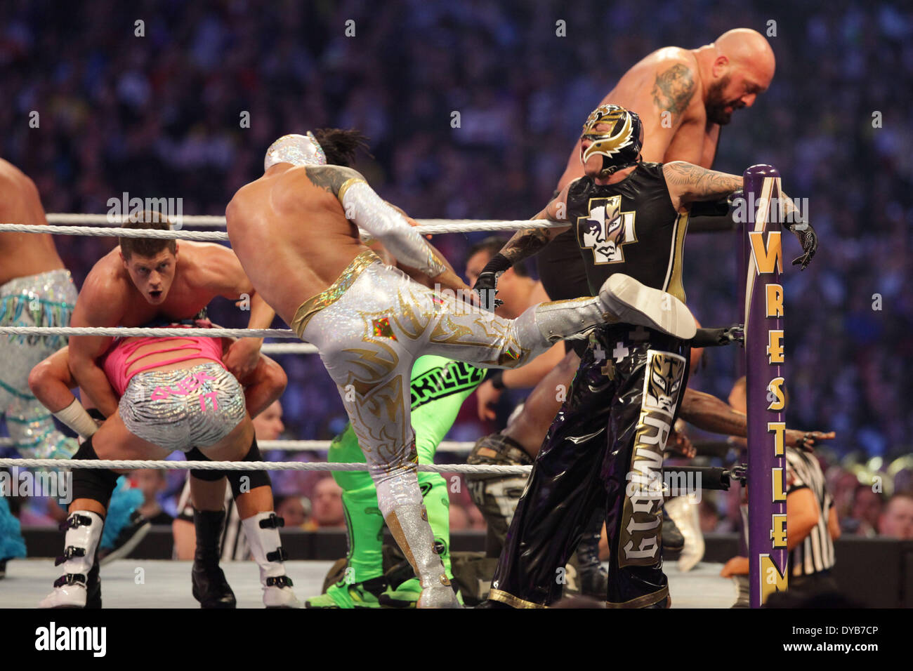 New Orleans, Louisiana, USA. 6th Apr, 2014. SIN CARA delivers a kick to Rey Mysterio outside the ring during the Andre the Giant Battle Royal during Wrestlemania 30 at the BMW Super