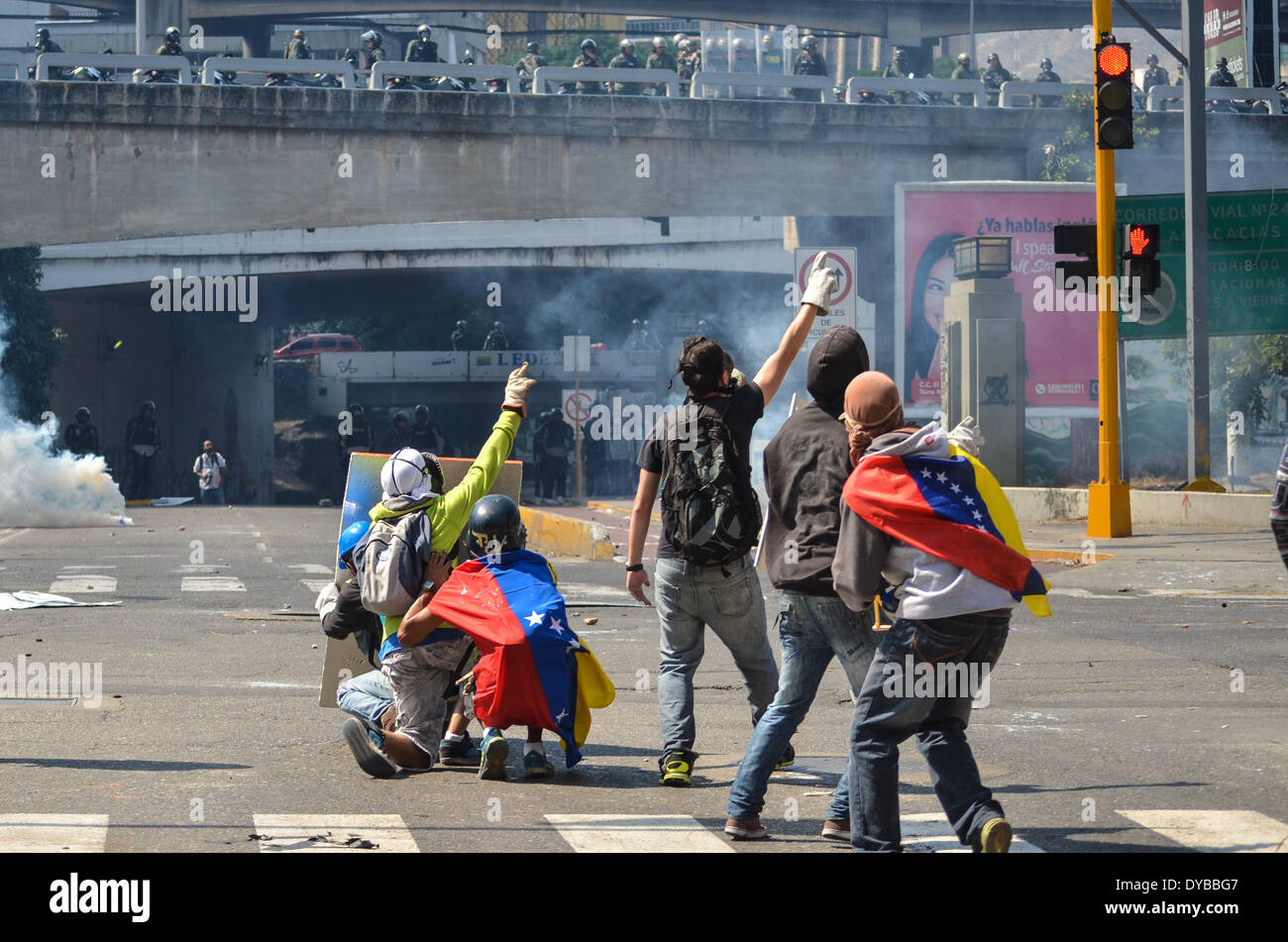 Caracas, Venezuela. 12th Apr, 2014. Demonstrators take part in an anti-government protest in Las Mercedes, Caracas, Venezuela, on April 12, 2014. Credit:  Carlos Becerra/Xinhua/Alamy Live News Stock Photo