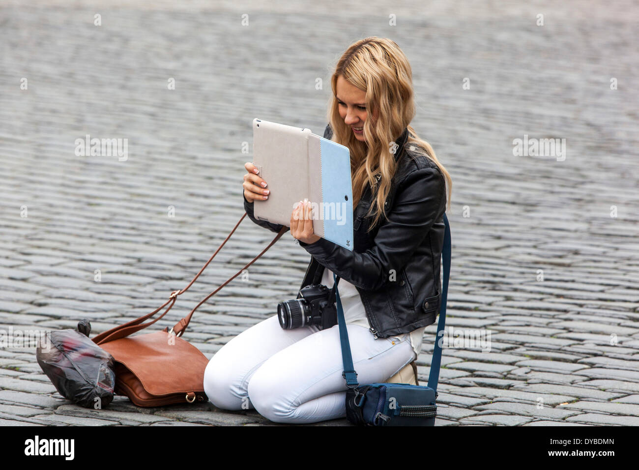 Prague tourist woman with laptop at Hradcany Square Prague Czech Republic Stock Photo