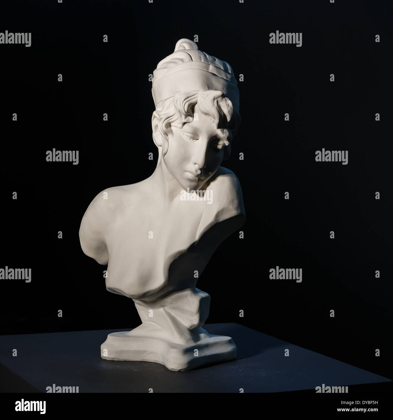 Plaster bust of the woman Stock Photo