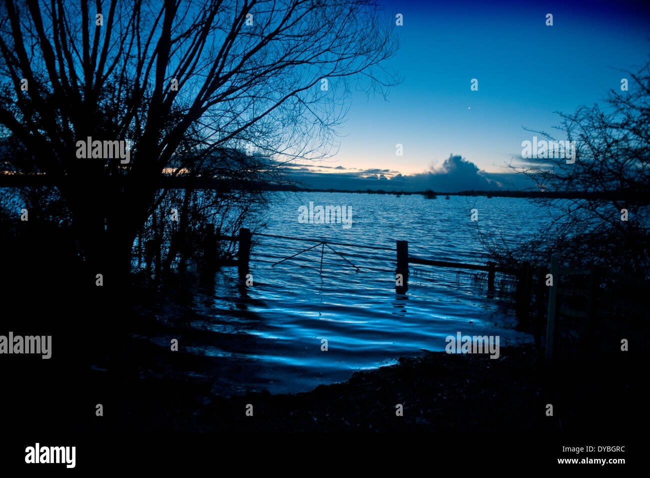 Dawn breaks over the flooded fields of the Somerset Levels near Burrowbridge UK Feb 2014 Stock Photo